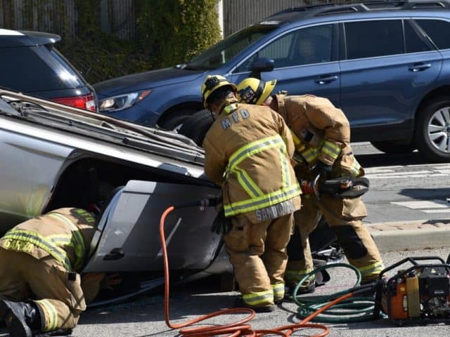firefighters at car accident